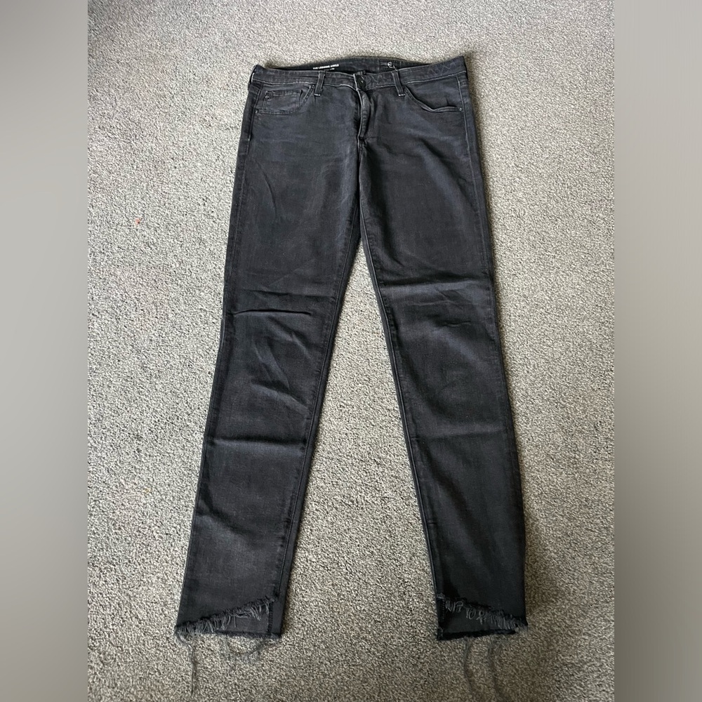 AG jeans Dark gray skinny jeans with distressed bottoms